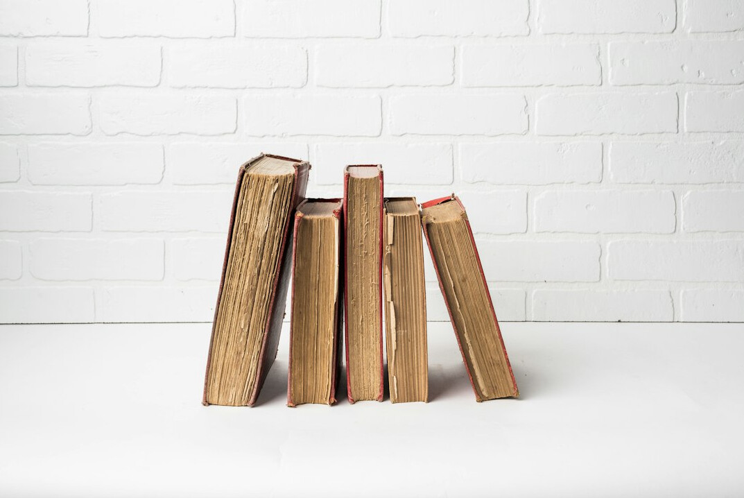 Stack of old books on a table